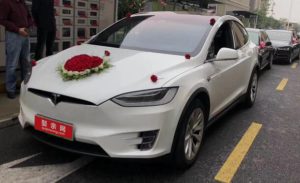 shanghai Tesla S and Audi A6L